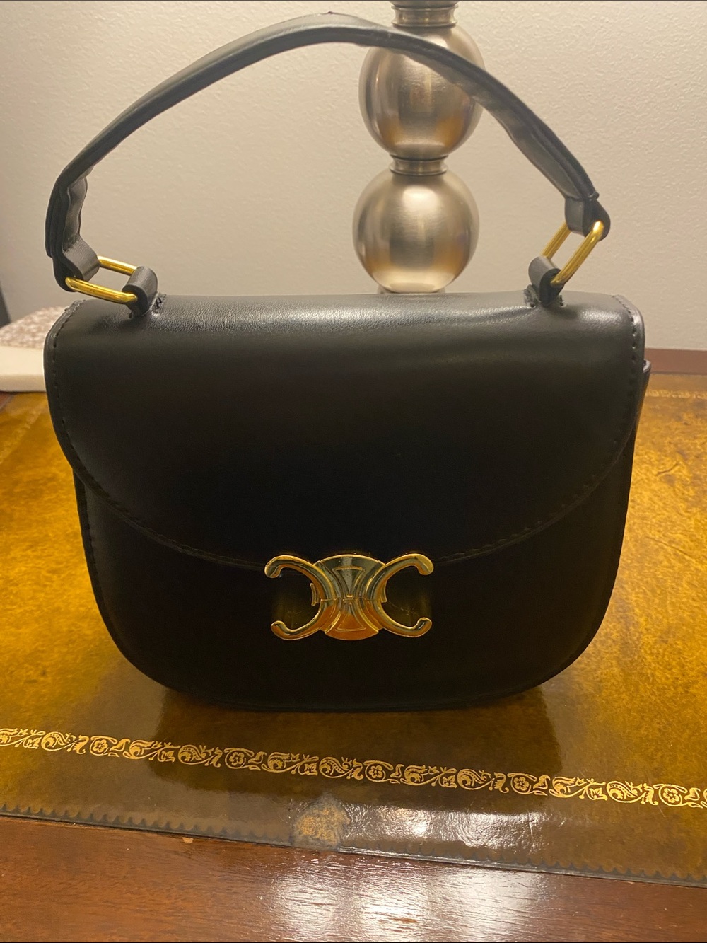 Black Leather small Top-Handle Bag with Gold Accent